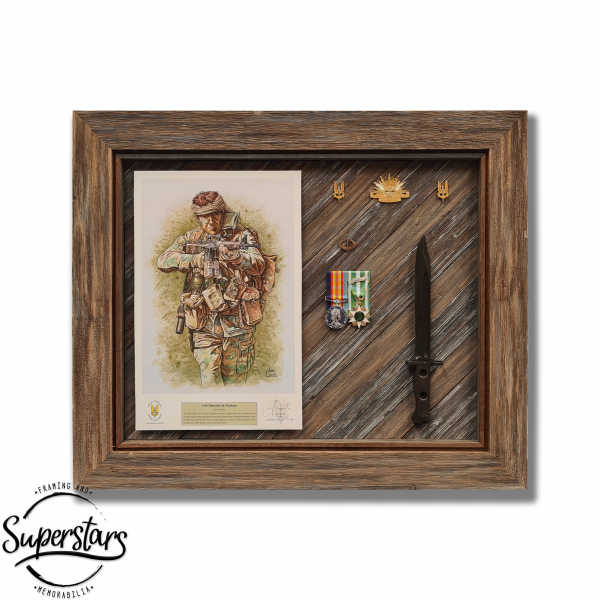 An SAS print, a collection of medals and a bayonet all framed in a light wood, weathered timber frame