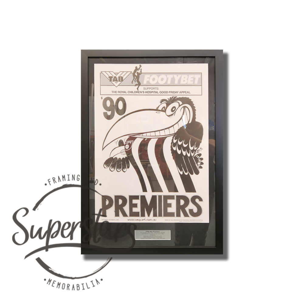 Collingwood Premiership Memorabilia. 1958 VFL Premiers. A cartoon magpie is the main feature, with the word Premiers across the bottom. This has been framed with a black border, black timber frame and silver plaque.